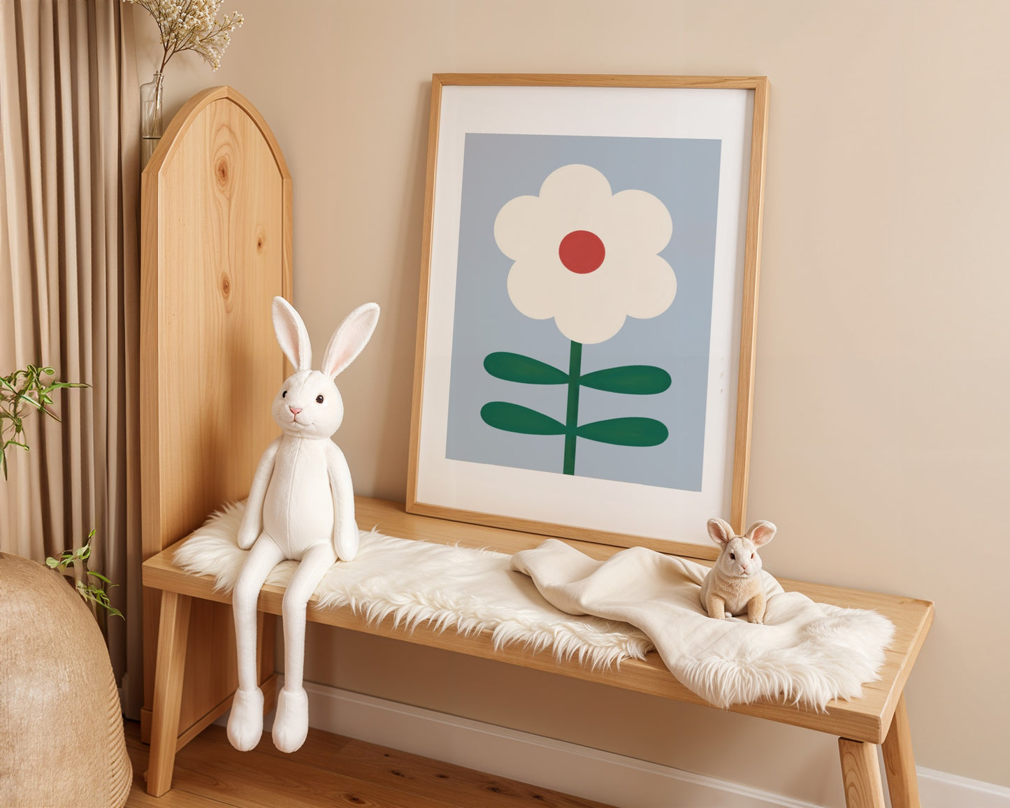 Kids wall art with bold white Daisy print and red pollen centre and four leaf stem on blue background