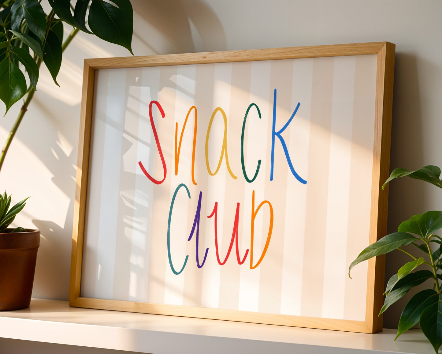Minimalist colourful wall art print with bold typography that reads snack club, modern kitchen decor for snack lovers