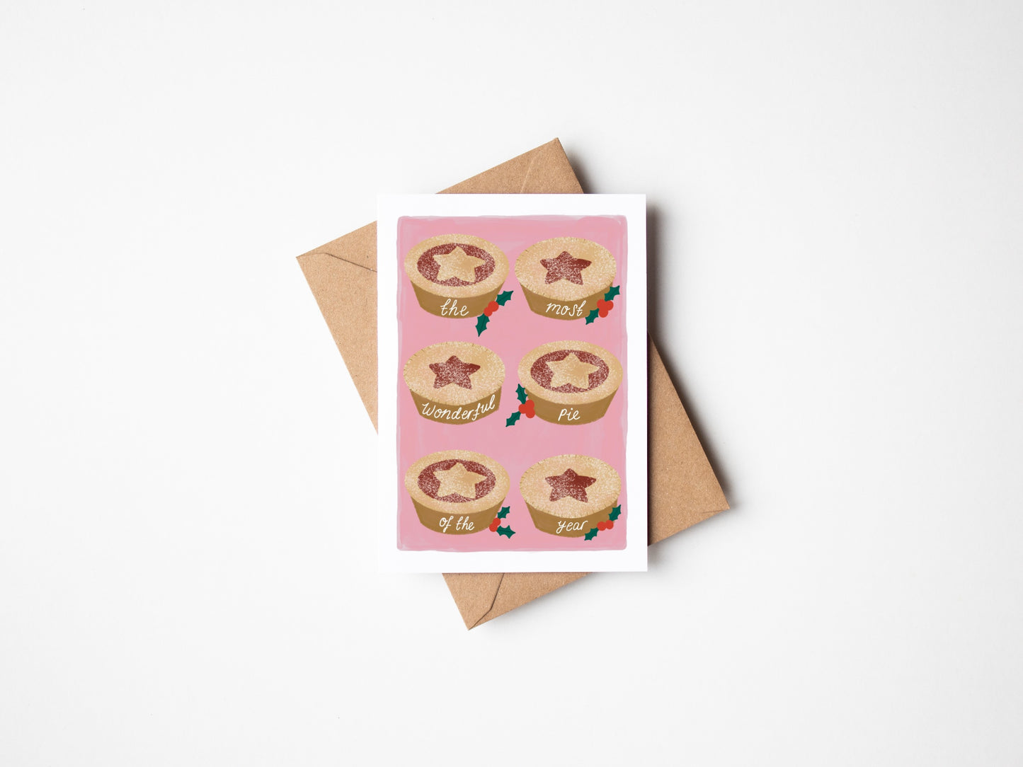 Greeting card with pie illustrations and a brown envelope on a white background