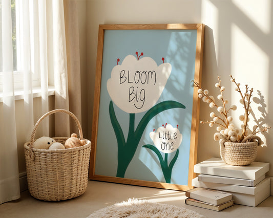 Inspirational girls nursery wall art featuring white tulips on a soft blue background with the quote ‘bloom big little one’