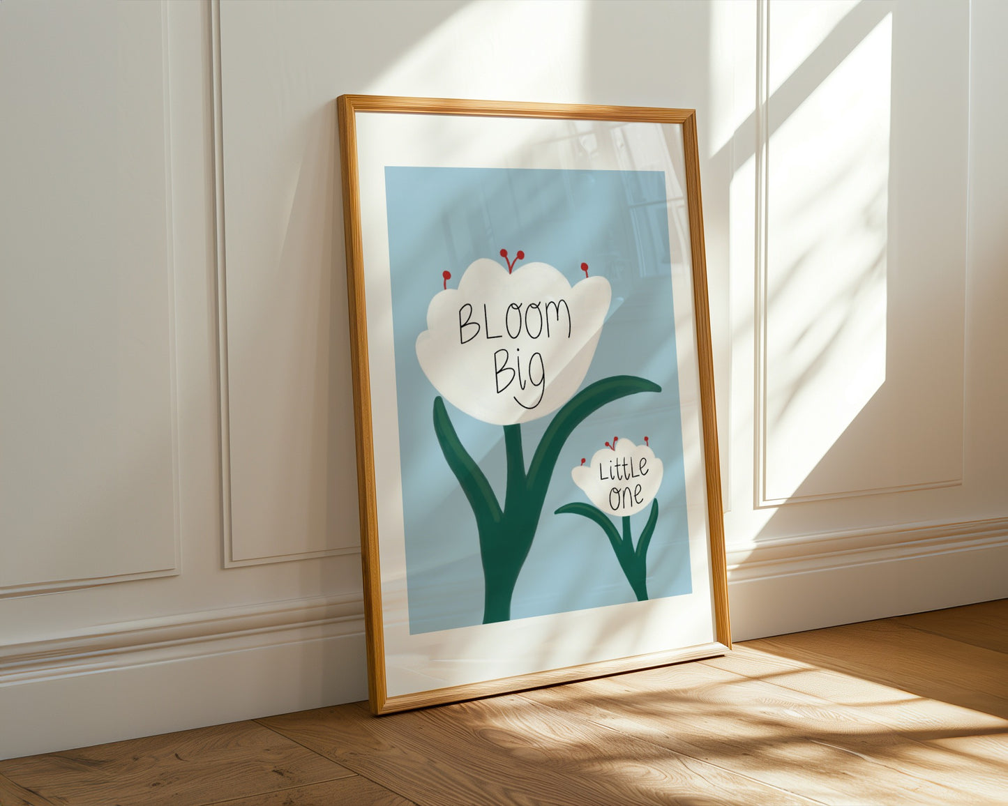 Inspirational girls nursery wall art featuring white tulips on a soft blue background with the quote ‘bloom big little one’