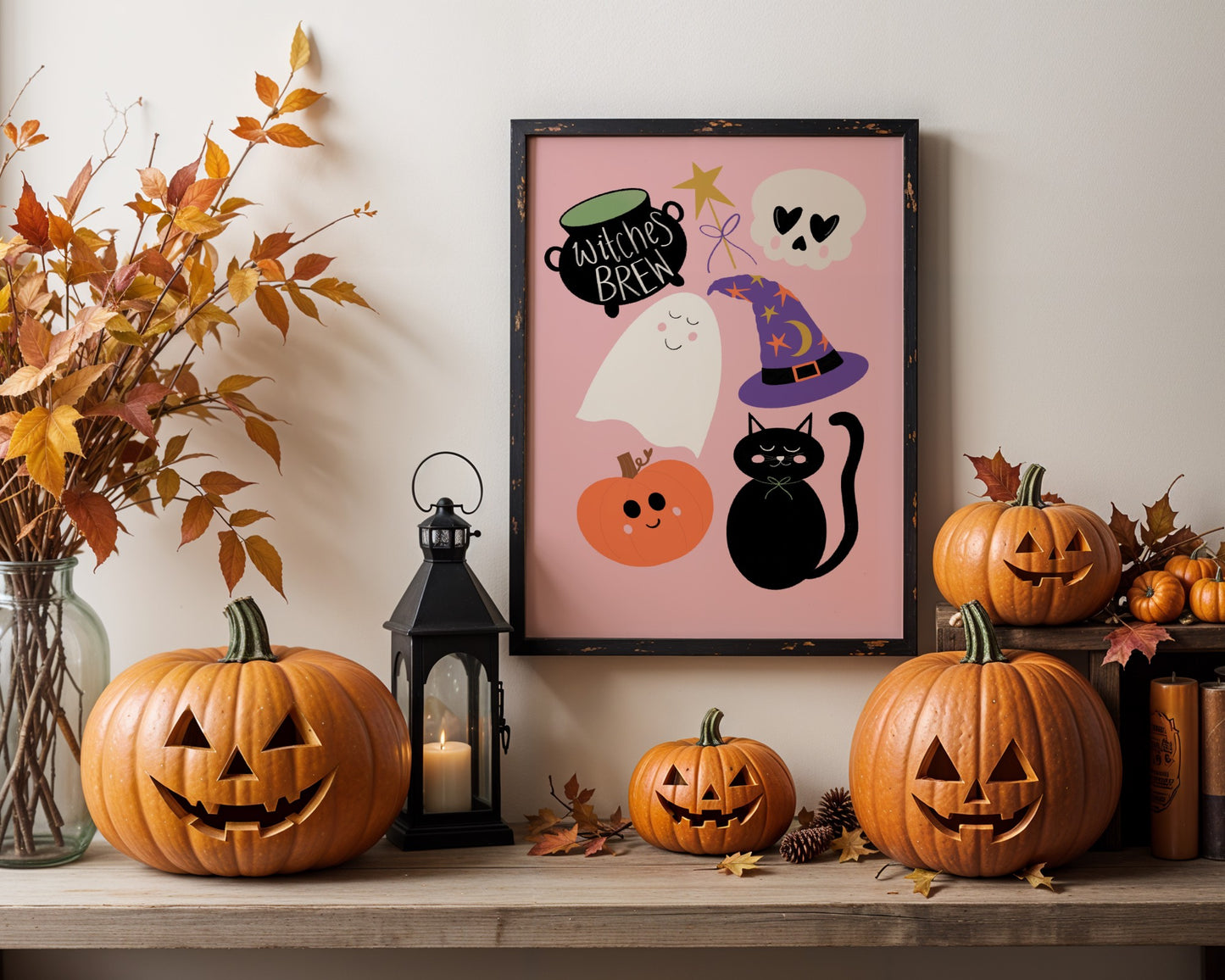 Halloween-themed decor with pumpkins, a lantern, and a framed poster on a shelf.