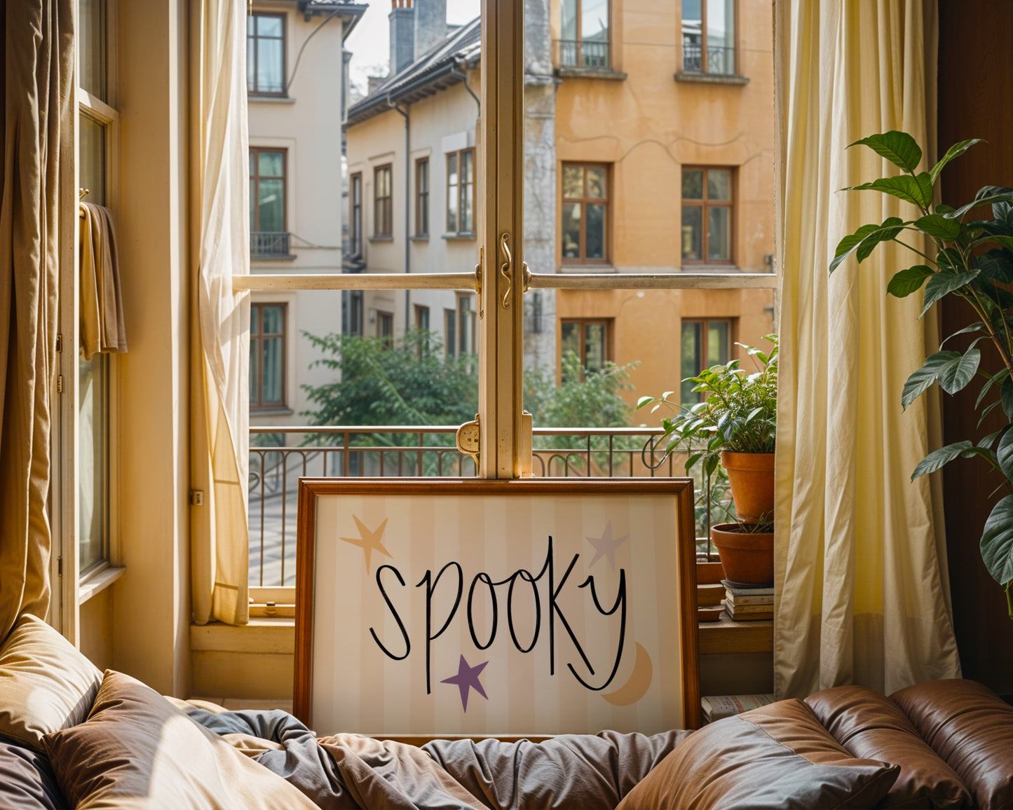 Decorative sign with 'Spooky' text on a couch in a room with a view of buildings and plants.