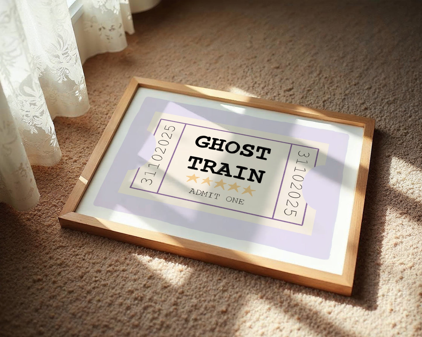 Framed poster with 'Ghost Train' text on a carpeted floor