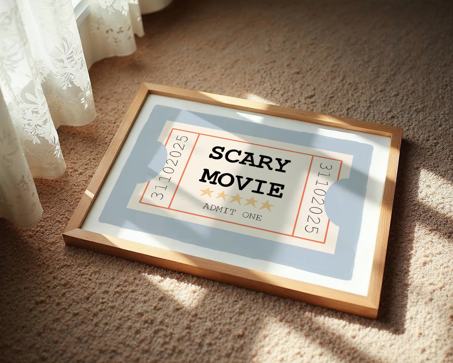 Framed movie ticket-style sign with 'SCARY MOVIE' text on a carpeted floor.