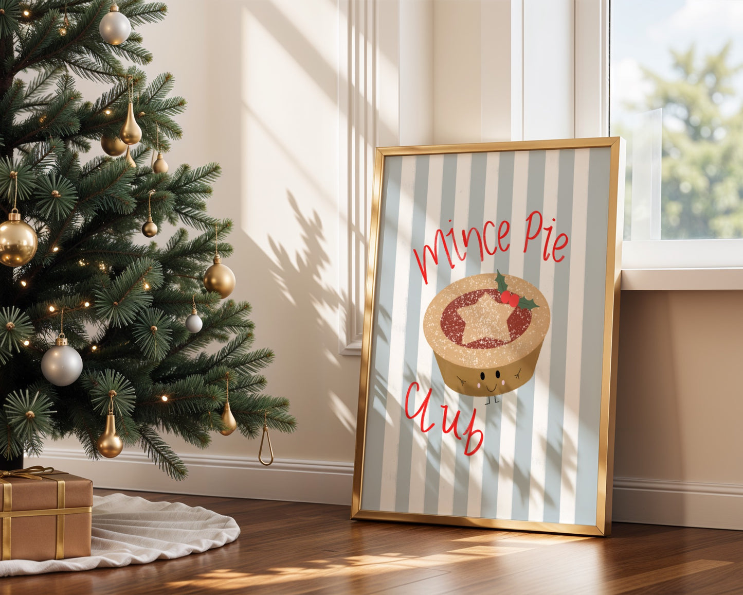 Framed picture of a mince pie with 'Mince Pie Club' text next to a decorated Christmas tree.