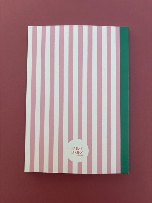 A5 lined notebook with pink and white stripes and large strawberry detail with green binding and word “notes”