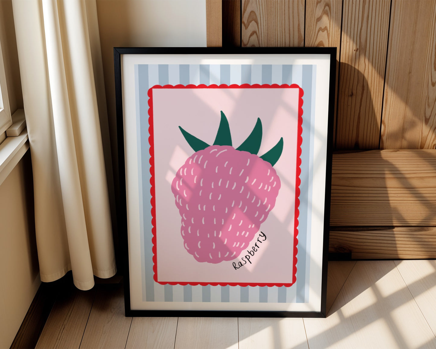 Kids art print with light blue striped background, pink centre with red scallop edge and a raspberry illustration and hand written text ‘raspberry’