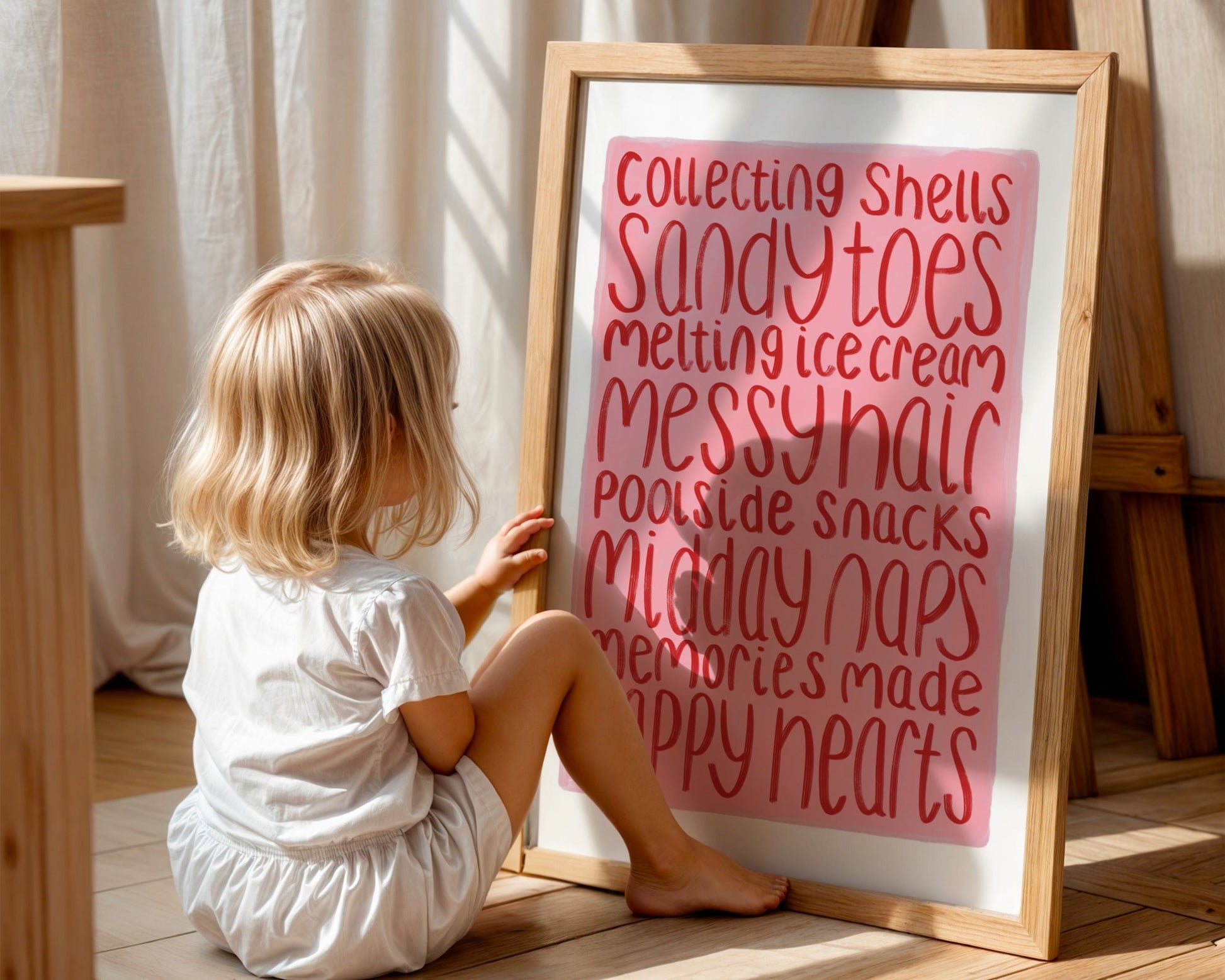 Kids wall art with white border, pink background and red text listing summer memories