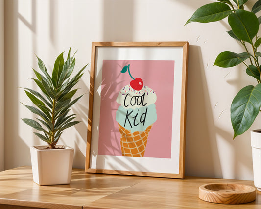 Kids wall art with pink background and mint and vanilla ice cream illustration with sprinkles and cherry on the top with the wording ‘cool kid’ 