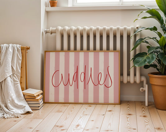 Kids wall art with pink striped background and red ‘cuddles’ text 