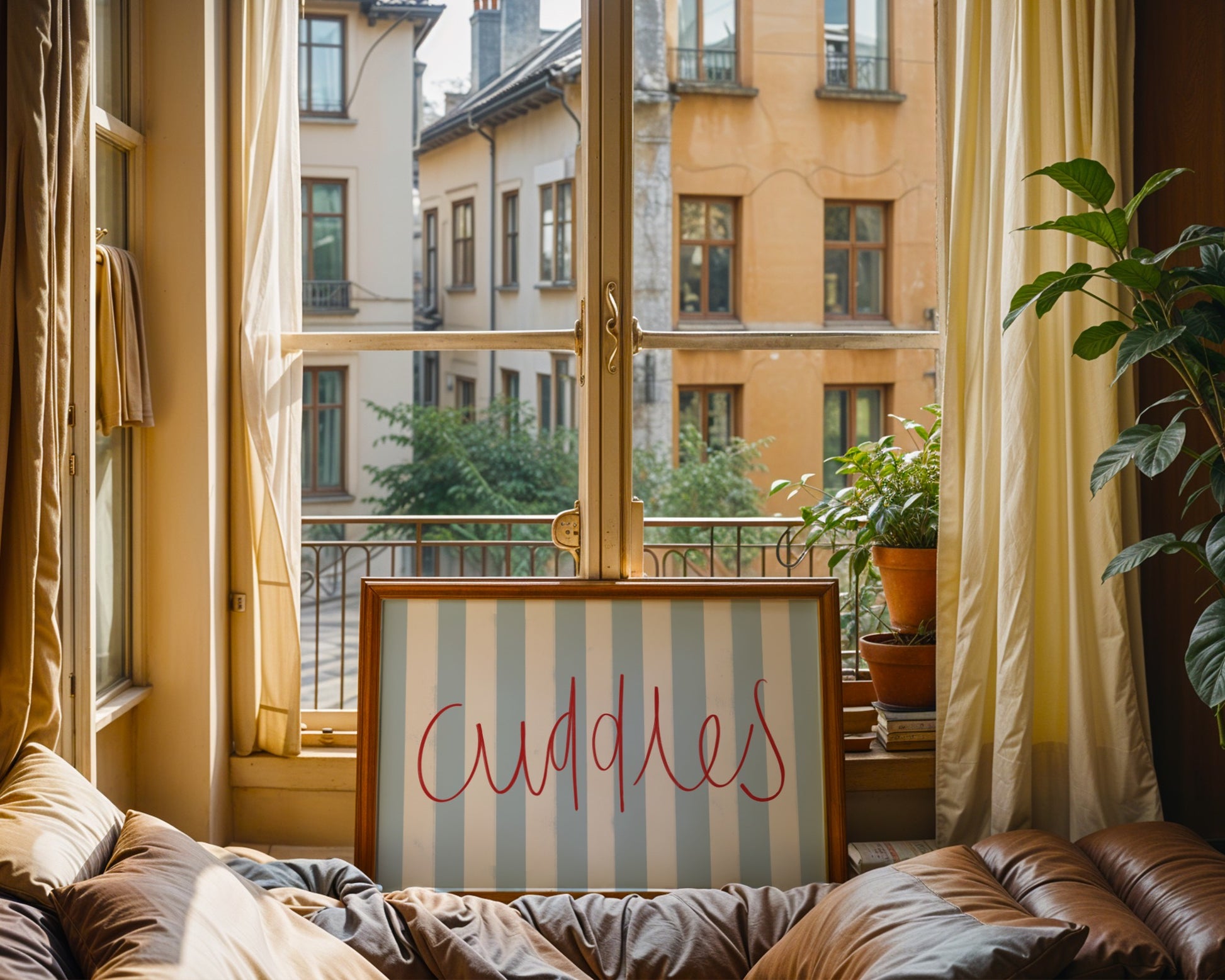 Kids wall art with blue striped background and red ‘Cuddles’ text