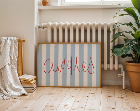 Kids wall art with blue striped background and red ‘Cuddles’ text