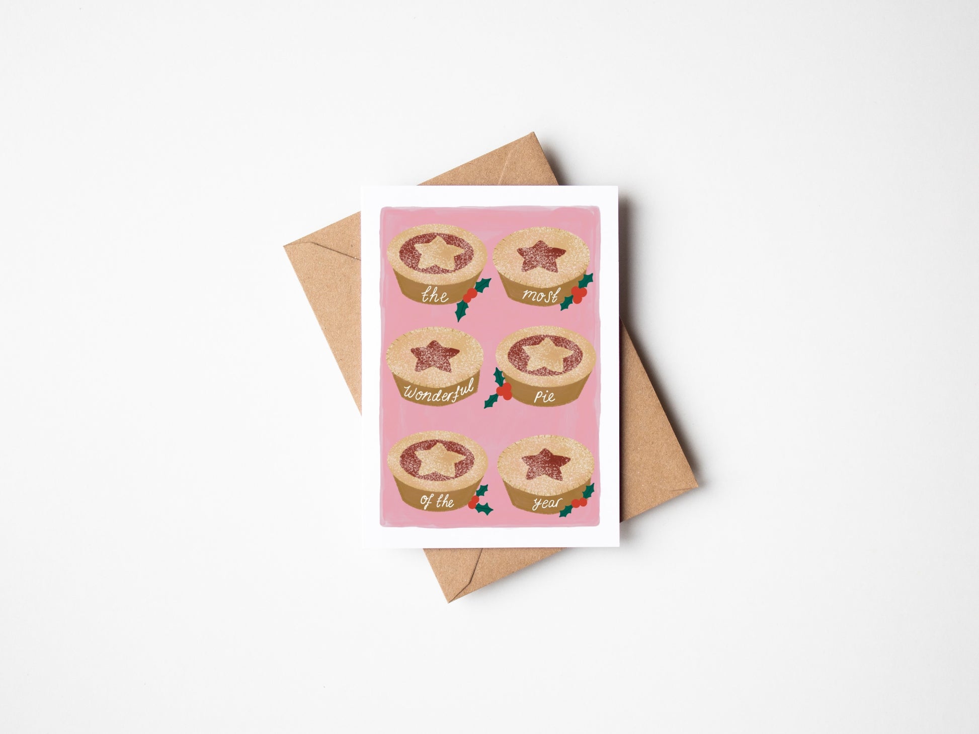 Greeting card with pie illustrations and a brown envelope on a white background