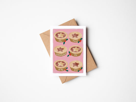 Greeting card with pie illustrations and a brown envelope on a white background