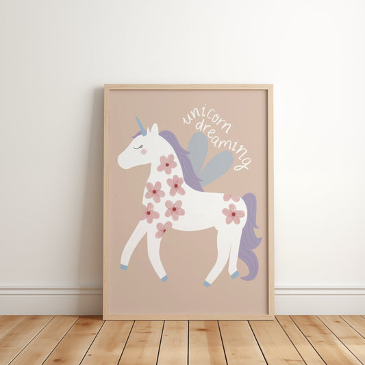 Pastel unicorn wall art print for girls featuring a white unicorn and the phrase ‘unicorn dreaming’- perfect for baby girl nursery or bedroom decor