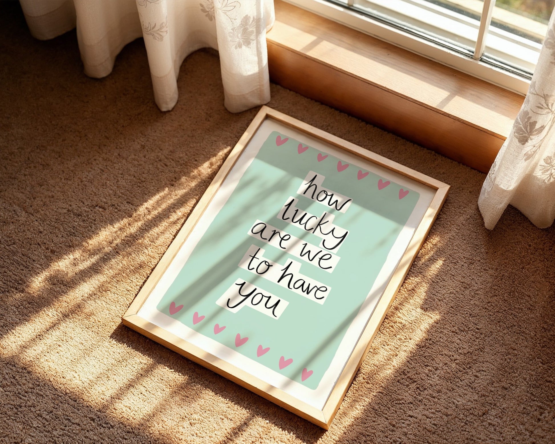 Framed quote on a carpeted floor with sunlight casting shadows