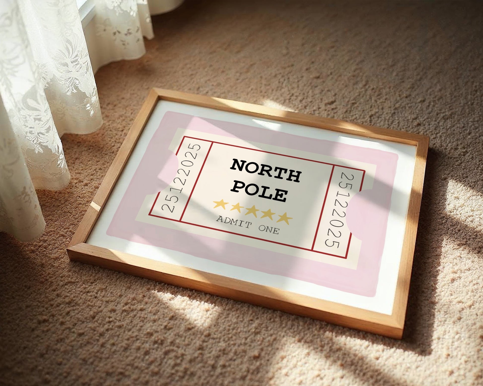 Framed picture of a 'North Pole' ticket on a carpeted floor