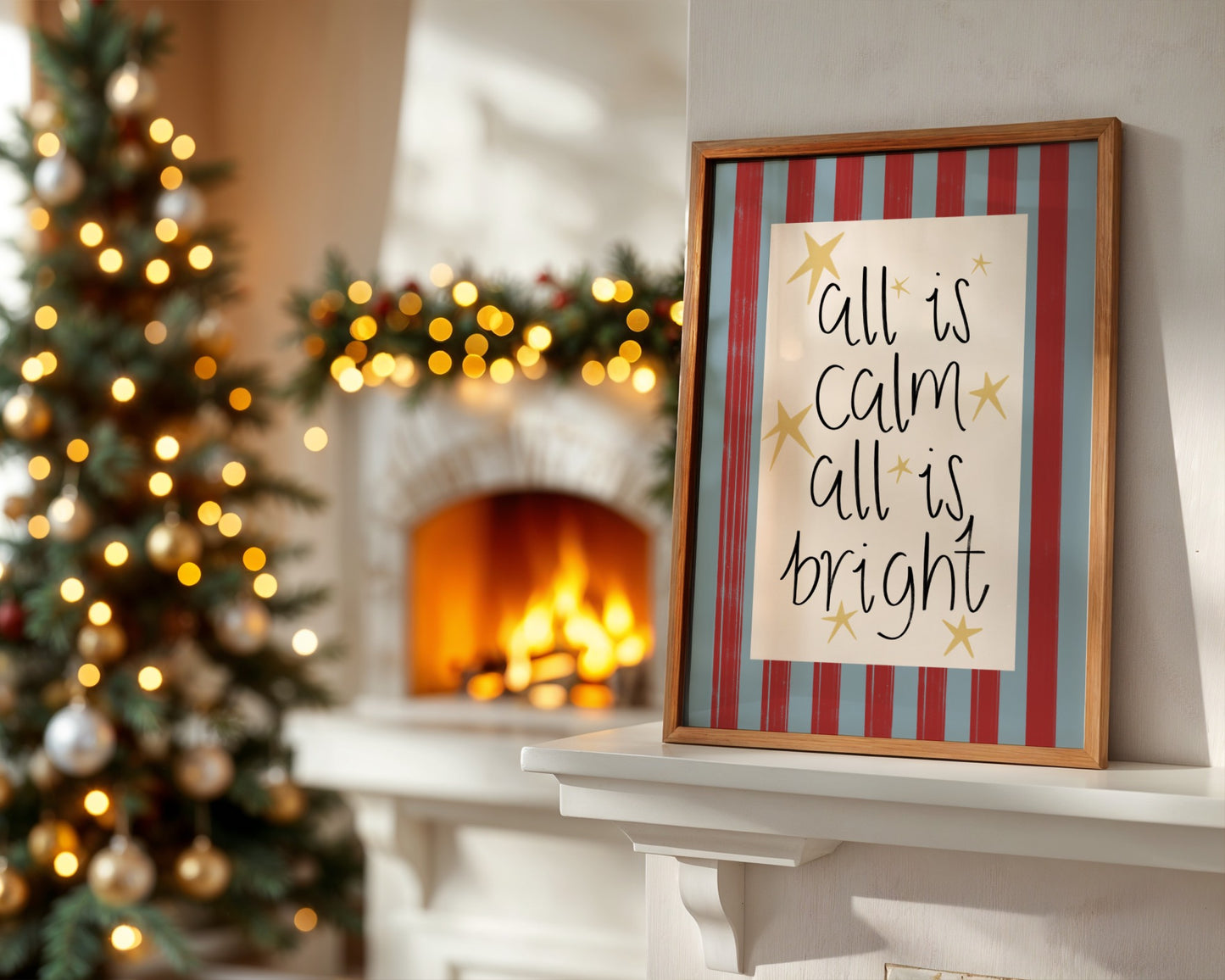 Framed Christmas sign on a mantelpiece with a decorated tree and fireplace in the background.