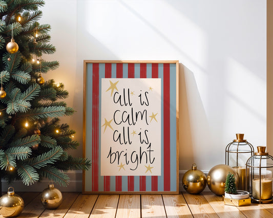 Framed Christmas sign with 'all is calm, all is bright' text next to a decorated Christmas tree.