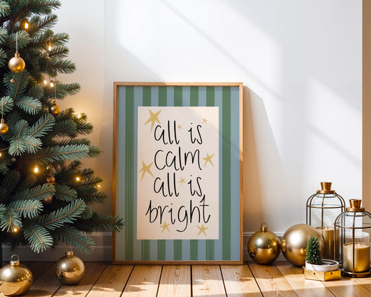 Framed Christmas sign with 'All is calm, all is bright' text next to a decorated Christmas tree.