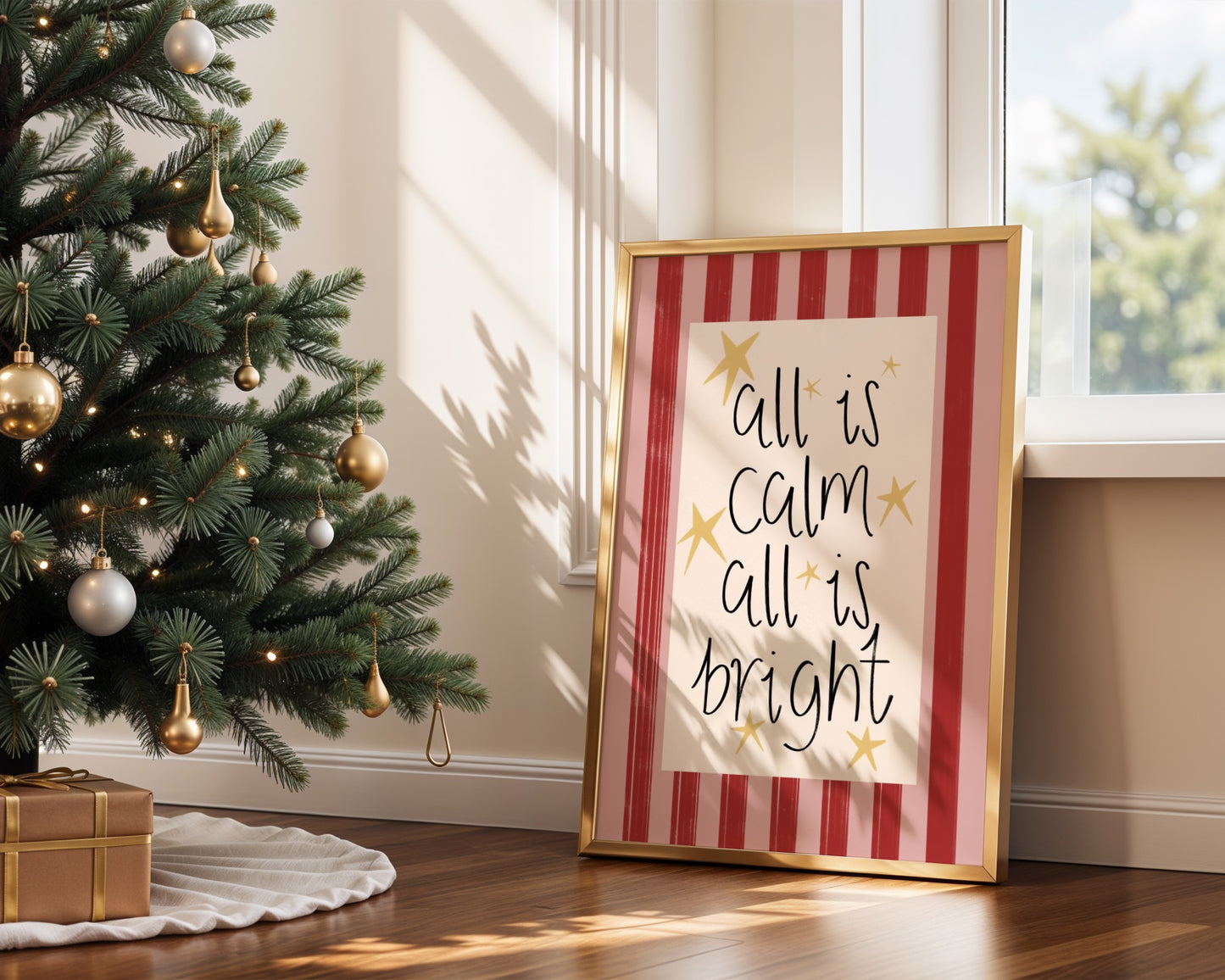 Framed Christmas-themed print with 'All is calm, all is bright' text next to a decorated Christmas tree.