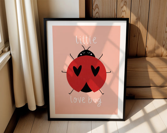 Kids wall art with pink background,  a hand drawn illustration of a ladybird with face and the words “little love bug” In white handwritten text.