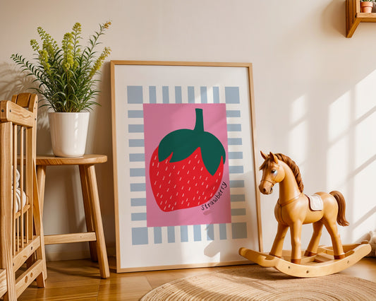 Kids wall art with blue and white striped border, dark pink centre and strawberry illustration with the hand written text ‘strawberry’.
